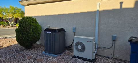 Central AC and ductless mini-split systems installed at a Las Vegas home, both requiring correctly charged refrigerant to run efficiently